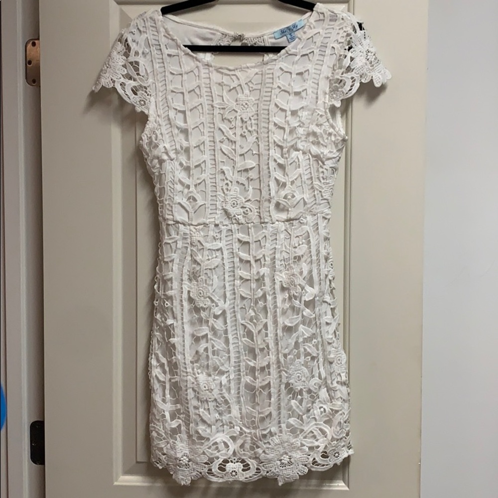 White dress with beautiful lace detail & open back